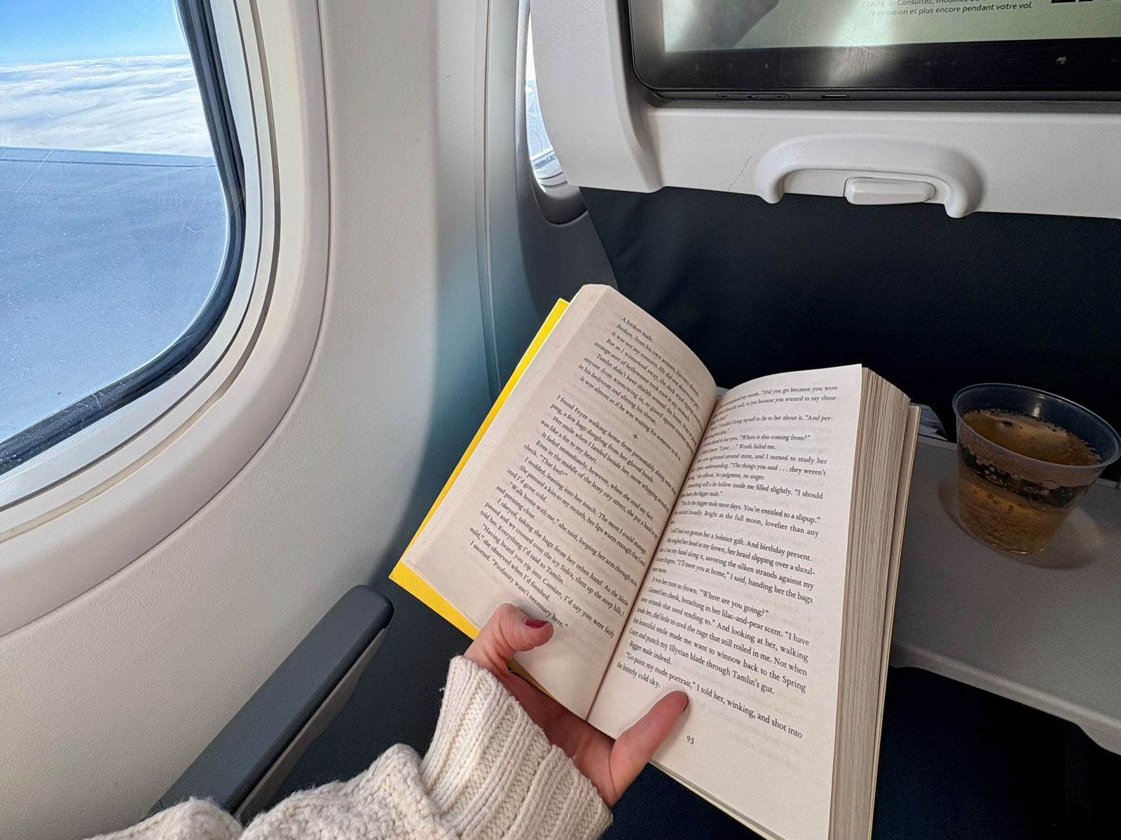 Reading book on plane instead of being on phone