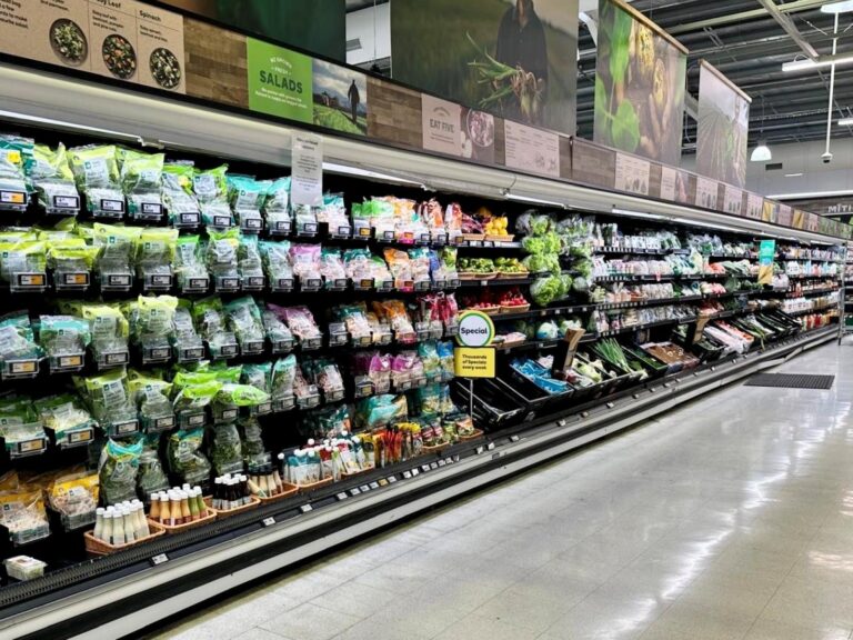 A view down a healthier grocery aisle emphasising the choice of choosing Ultra-Processed Foods While Travelling