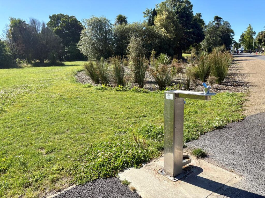 Water fountain in a park, helping to hydrate while travelling