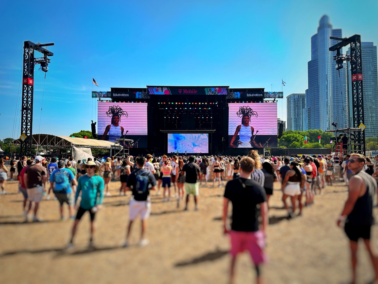 At the back of a crowd at Lollapalooza Chicago, maintaining wellbeing at festivals