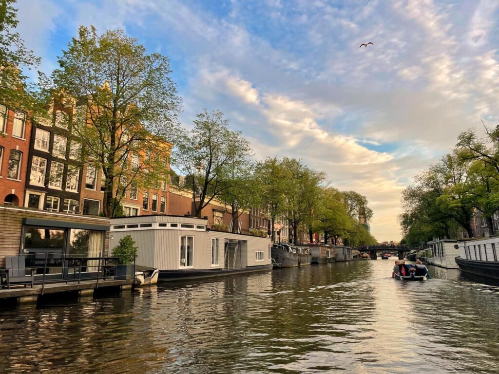 A boat ride through the canal on a calm evening