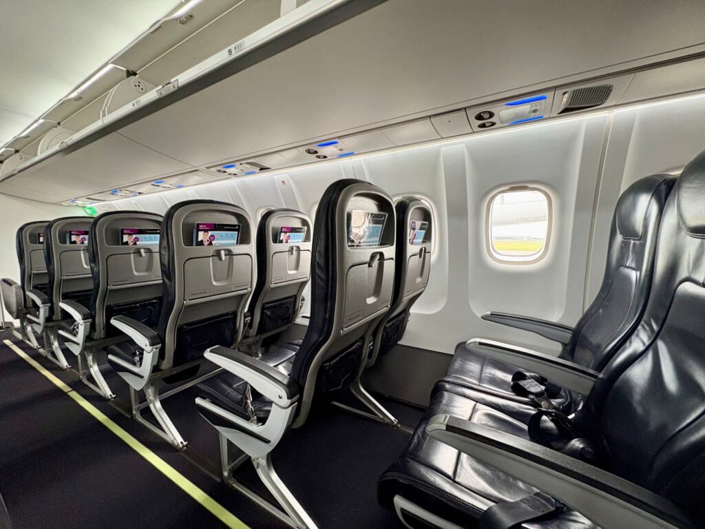 Empty rows of seats on a small aeroplane