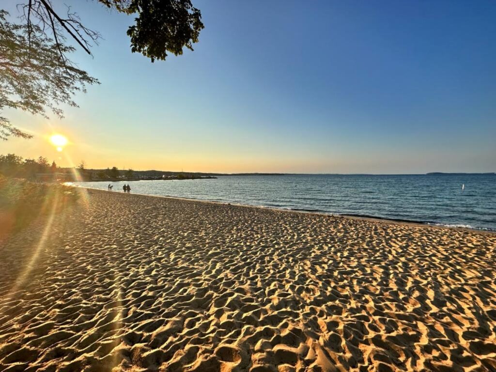 Watching the sunset from the beach in Traverse City