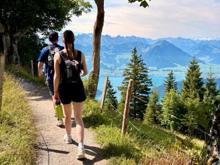 Woman and man hiking in Switerzerland
