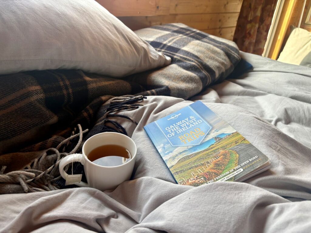 A calm way to start the morning with cup of tea and guide book
