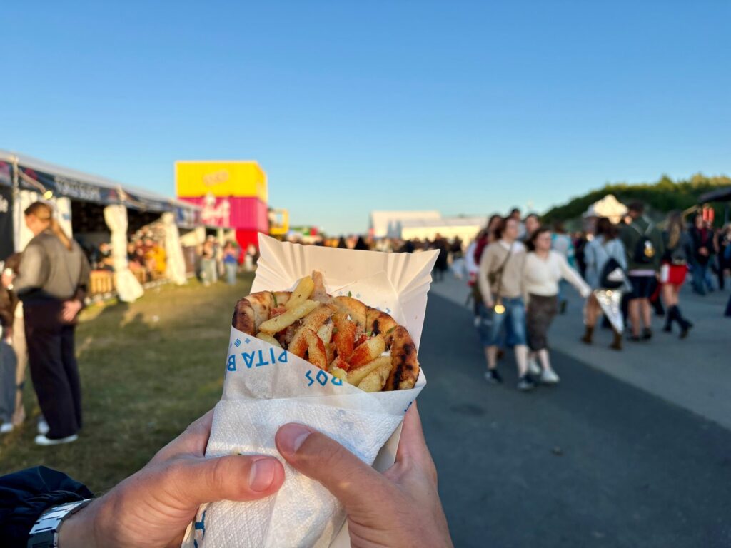 A festival food item being held up at the food section of Open'er Festival, Poland