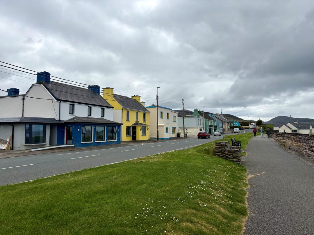 View of a row of houses in Waterville during an Irish road trip including the Ring of Kerry
