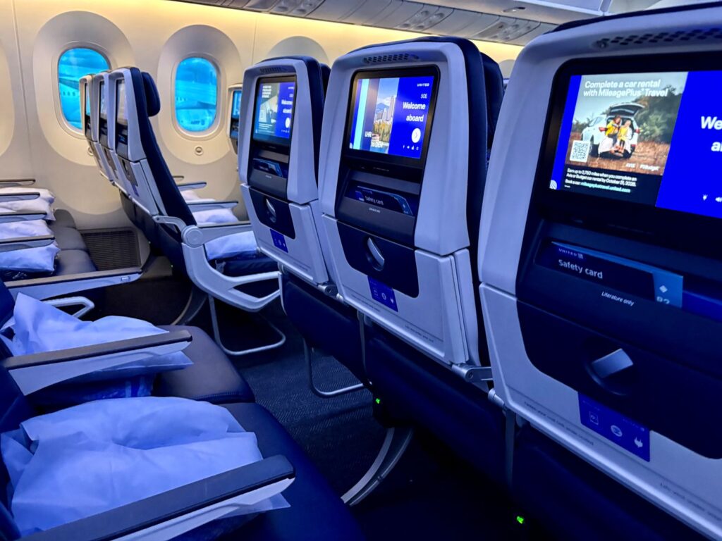 Before take off on a United Airlines flight showing economy row seats