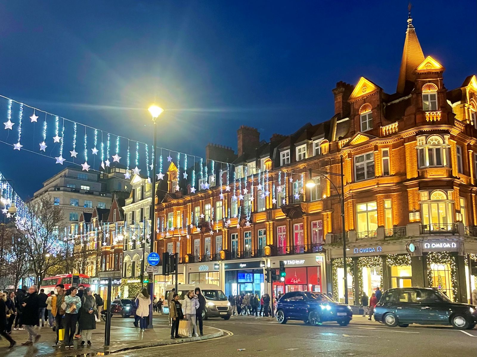 A London street with Christmas lights viewed when travelling at Christmas